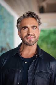 Martyn Lawrence Bullard's commanding mix of graphic patterns, terrazzo tile  and metallic furniture