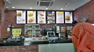 A professionally done by a burgerman in singapore. Makan Tengahari Di Burger Ramly Mama Maszull