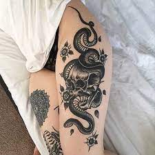 Snake tattoos positioned on one's ankle tend to be pointing up. Snake Female Hip Thigh Tattoo Novocom Top