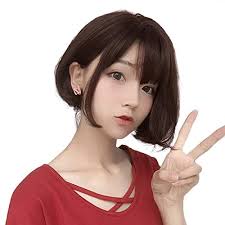 With so many celebrities, from bella hadid to lucy hale rocking short dark hair, we can completely understand if you've been tempted to go for a cropped look. Amazon Com Aiyaya Short Bob Wig Bangs Bob Synthetic Wig For Women Cosplay Costume Natural Hair Lolita Wig With Wig Cap Brown Beauty
