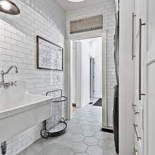 But in our opinion, it's those little modern touches—like open shelving and concrete flooring—that really elevate this kitchen, bringing it back to the present day. 75 Beautiful Farmhouse Ceramic Tile Laundry Room Pictures Ideas July 2021 Houzz