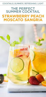 Easy Strawberry Peach Moscato Sangria Refreshing White Wine Sangria Recipe In 2020 Moscato Sangria Moscato Sangria Recipes White Wine Sangria Recipe