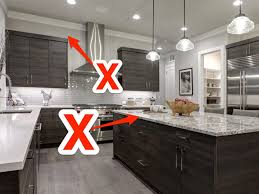 Cutting a kitchen or bathroom cabinet to receive an electrical box should be done accurately. Interior Designers Reveal The Worst Mistakes To Avoid With A Kitchen