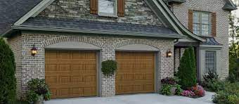 We're chicago's leader in in many instances, the garage door is the door most used in the house. Steel Vs Wood Garage Doors Dot Com Women Garage Door Styles Garage Door Design Garage Doors