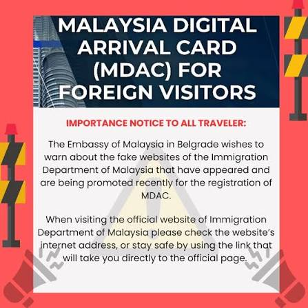 Malaysia Digital Arrival Card MDAC online form on a laptop screen, travel documents