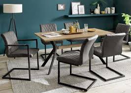 Here you can explore a plethora of styles with complete your selection with a designer dining table from our collection today, and take advantage of free delivery on orders over £35. Modanuvo Industrial 6 Seater Dining Set Metal Oak Table Grey Vintage Leather Dining Chairs Lodge Furniture Uk