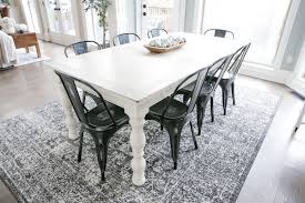 As recommended by houzz, the general rule of thumb is that the rug extends at least 24 past the table on all sides. Our New Kitchen Table And Rug For Eight Bower Power
