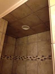 Therefore, shower lights are usually defined by having the actual light enclosed in a waterproof housing that prevents moisture from sipping in. Tiled Shower Ceiling I Like The Can Light In The Ceiling I M Wondering About Moisture And Electrical T Shower Ceilings Shower Tile Beautiful Bathrooms Modern