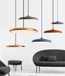 Made from metal and available in different finishes, this light features a canopy, an adjustable downrod, and a large cylinder shade that'll direct the light downward. Scandinavian Art Restaurant Pendant Lamp Modern Simple Design Danish Bar Creative Makarion Flyer Pendant Light I Home Decor Art Restaurant Cheap Pendant Lights