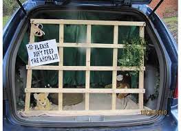 Trunk Or Treat Idea Maybe The Dog Dressed As A Lion Behind The Bars I So Love This One Trunk Or Treat Truck Or Treat Fall Halloween Crafts