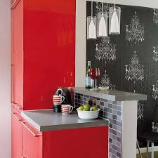 A lipstick red aga stove with dark cabinets. Modern Kitchen Design In Revolutionizing Bold Red Color