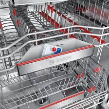 Pour detergent into the dispenser (insert tablet flat, not on its edge). Bosch Serie 4 Free Standing Dishwasher 12 Sets White