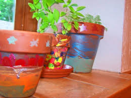 Beautiful peacock shaped flower pot made using children's clay. More Kid Made Terra Cotta Pots A Painted Flower Pot Decorating On Cut Out Keep
