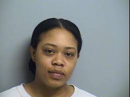 Woman accused of stabbing neighbor over DVD player