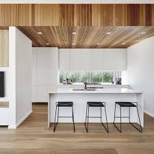 All White With A Timber Batten Ceiling Creates A Stunning Kitchen By Rawsonhomes Kitcheninspo Kit Timber Ceiling Bulkhead Kitchen Custom Kitchens Design