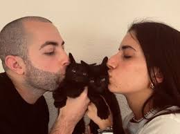 Happily adopted cats at Aldea Felina say hello!