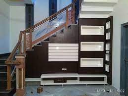 Turn the space under your stairs into a home office. Stairs Covered Lcd Panel Design Wall Tv Unit Design Lcd Wall Design