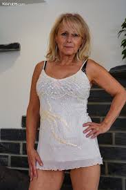 Slutty granny Martina K fingering & dildoing her horny shaved pussy on a  couch - Pichunter