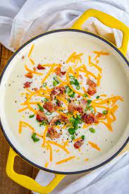 Turn off the heat (makes sure the heat is off or the sour cream will curdle) and add the cheddar cheese and sour cream and mix it all together. Baked Potato Soup Dinner Then Dessert