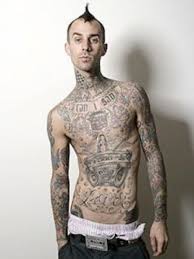 If anyone deserves a tattoo review here is the man. Top 10 Hottest Male Rockers Travis Barker Tattoos Travis Barker Celebrity Tattoos