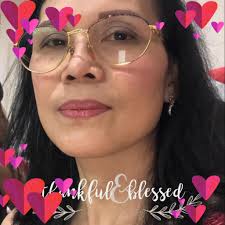 Osprey flying with a broomstick in Kendall Yards