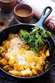 Spiced Indian Potatoes And Egg Breakfast Skillet Recipe Indian Food Recipes Potato And Egg Breakfast Recipes