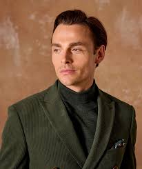 Meet the Dorsey. A tailored double-breasted suit in rich moss green, with  tonal buttons and soft corduroy cloth, it's designed to make you stand out  at every autumn occasion. Now available in