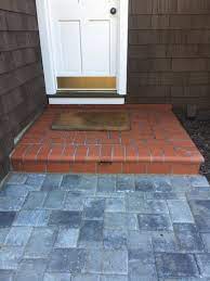 Brick pathway repairs and installation by capital masonry. Select Pavers On Twitter A Recently Completed Installation Including Brick Pillars And A Brick Front Door Landing Atop Color Contrasting Interlocking Pavers Interlockingpavers Pavers Construction Renovation Harscapes Driveway Https T Co