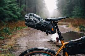 Included with the blackburn outpost frame bag is a strap mounting system that doesn't require any additional tools. Blackburn Outpost Elite Universal Seat Pack Review Bikepacking Com
