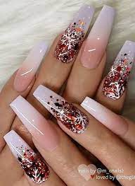 Amazing red christmas acrylic nails coffin shaped design consists of candy cane nails, snowflake nails, and adorned with glitter. Pin On Cute Nails