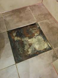Water damage behind shower tiles. How To Repair Leak Mould Under Bathroom Floor Tile Home Improvement Stack Exchange