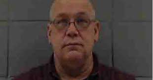 Behm fired from Woodstock after theft arrest