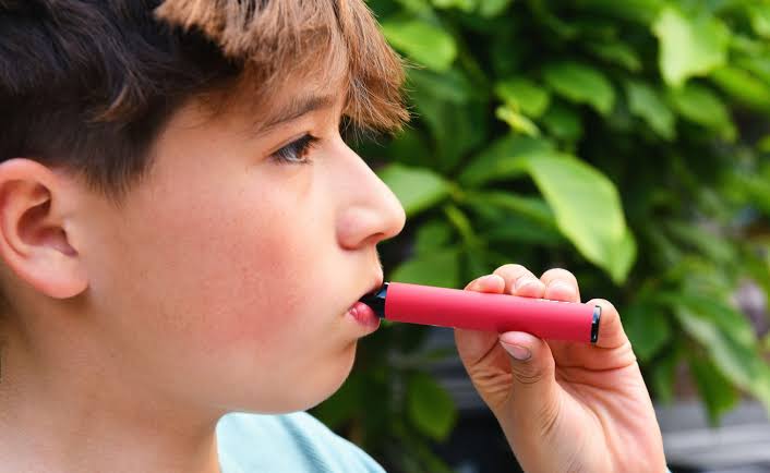 Kids who vape 'are THREE times more likely to smoke', drink and take drugs later - and suffer agonising symptoms