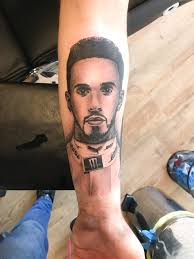 We have all got used to seeing hamilton on the top step of the. Lewis Hamilton Tattoo Artist