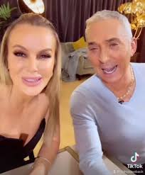 Amanda Holden wows in plunging strapless top in cheeky clip with BGT  co-star Bruno Tonioli