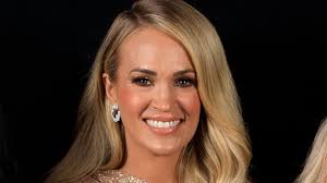 Carrie Underwood wows in sultry gown for special performance