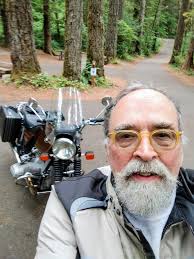 77 years old and riding my 2007 地 番 Aeeoll 0 AnCUk سد Ф e OMC 0 eiO