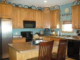 Light Turquoise Kitchen Walls With Brown Cabinets Turquoise Kitchen Kitchen Design Decor Blue Kitchen Walls
