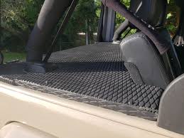 I suppose you can make a similar one from some scrap metal: Diy Tonneau Cover Jku Jeep Wrangler Forum