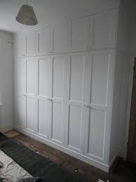 White Spray Painted Wardrobe Floor To Ceiling Floor To Ceiling Wardrobes Painted Wardrobe Build A Closet