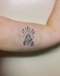 Minimalist Fire Tattoo On The Left Bicep Fire Tattoo Minimalist Fire Tattoo Tattoos