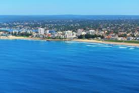 A drone shot overlooking cronulla from blackwoods beach, all the way to wanda sand dunes. Cronulla Beach Chilby Photography
