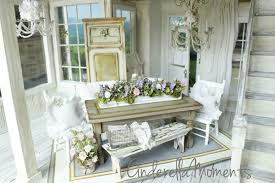 Shabby chic arrangement for a light and spacious dining room furnished with a long kitchen table made out of oak wood with a highly distressed coat of white paint and a smooth, polished top surface which nicely fits the long wooden bench. Cinderella Moments Dollhouse Shabby Chic Dining Room Set