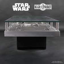 The bounty hunter is lounging on his couch with his feet propped up on han solo's frozen body. Han Solo Carbonite Coffee Table Regal Robot