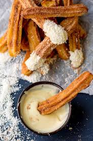 Baked Churros With White Chocolate And Coconut Festival Food With An Upgrade The Kids And Grown Ups Love Them As A Weekend Tr Food Churros Coconut Recipes