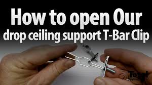 In order to put in a drop ceiling, you need to first install a grid system of runners. How To Open Our Drop Ceiling Track Lighting Support T Bar Clip By Total Track Lighting Youtube