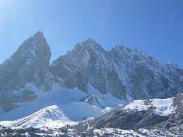 Its highest peak is named shanzidou (扇子陡) and is 5,596 m (18,360 ft) above sea level. Jade Dragon Snow Mountain Lijiang Yulong Snow Mountain Yunnan