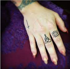 Pin By Mary Thomaston On Tattoos Cross Finger Tattoos Finger Tattoo For Women Small Finger Tattoos