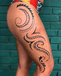 The simple and light feather lying in a curvilinear position on the side of the hip has a n appealing look. Top 71 Best Tribal Tattoos Ideas For Women 2021 Inspiration Guide