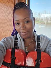 Captain Tot living his best life while his help drives the boat.